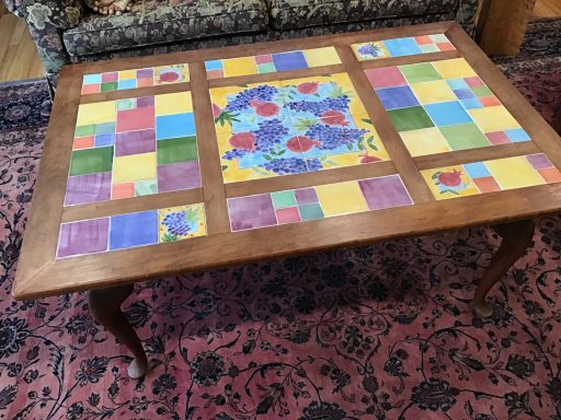 Coffee table with hand-painted tiles